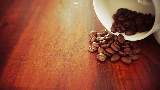 咖啡豆和木勺子咖啡背景
