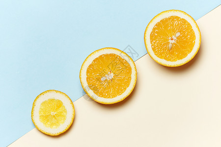 柠檬黄背景摆放的水果素材背景