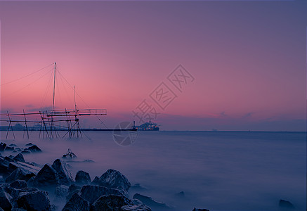 海滩游轮余晖背景