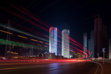 复杂的光轨迹城市建筑夜景风光背景