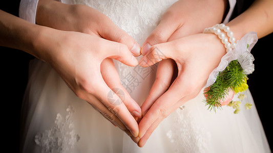 婚礼用爱心爱心的手背景