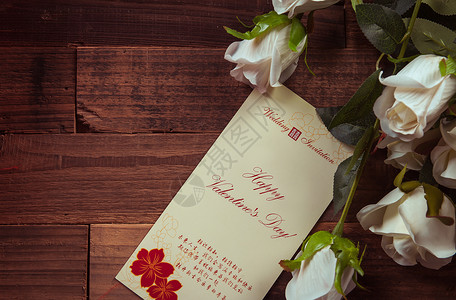 花艺婚礼白玫瑰与贺卡背景