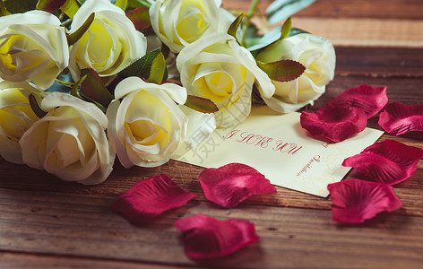黄色清新爱心玫瑰花与贺卡背景