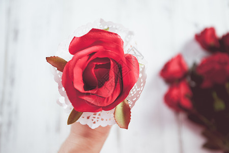 婚礼红素材手持红玫瑰背景