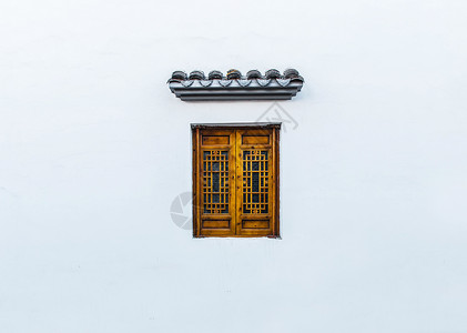 古代复古素材白墙上的古窗背景