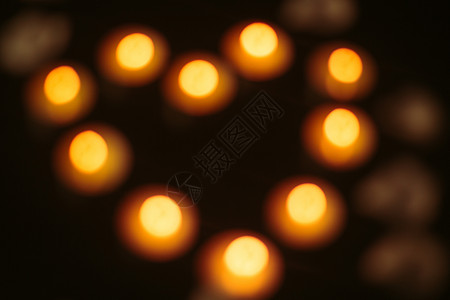 四川地震救援虚化的爱心蜡烛背景