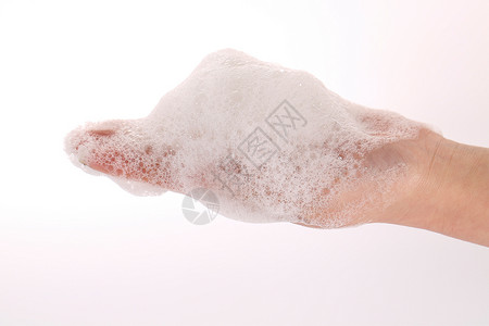 手上的泡沫泡沫洗手高清图片