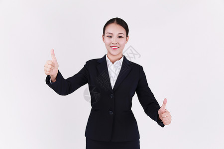 竖起大拇指点赞的职业女性客服形象图片