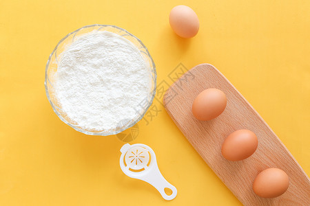 清新食品素材鸡蛋面粉黄色背景静物背景