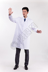 穿着白大褂做手势的医生图片