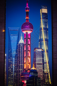 中国东方明珠上海陆家嘴彩色三件套建筑夜景背景