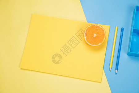 橙色铅笔创意水果办公桌面背景