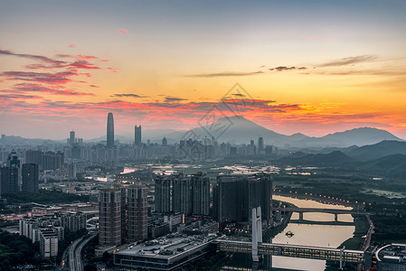 香港口岸朝霞满天城市建筑风光背景