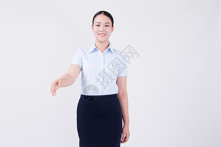 伸手握手动作的职业女性形象图片