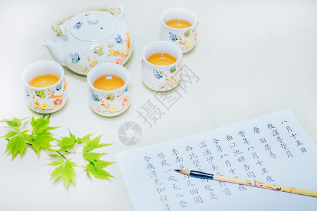 茶诗词与毛笔背景图片