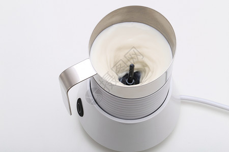 奶泡壶厨房用具加热壶高清图片
