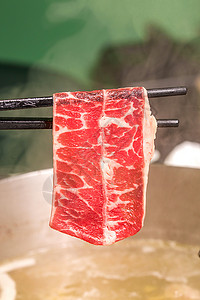 顶级雪花火锅涮牛肉图片