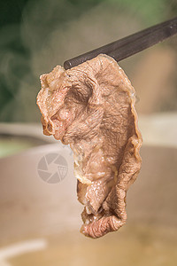 顶级雪花火锅涮牛肉高清图片