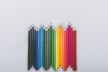 火箭铅笔组合波浪起伏状彩色铅笔背景