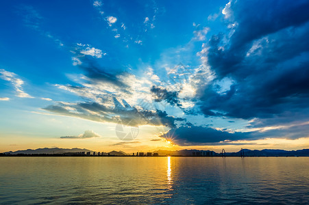 日落江景夕阳下的江边高清图片