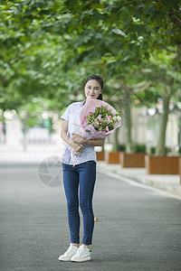 礼献教师节教师节女老师收到学生献的花背景