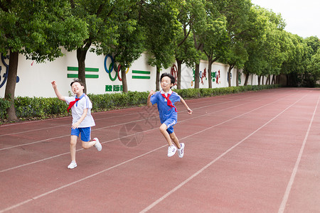 学生晨跑操场上跑步运动的小学生背景