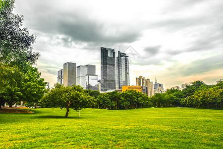 蓝天草地城市简约城市建筑绿化单色调背景图背景