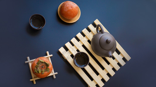 中秋赏月茶具与柿子图片