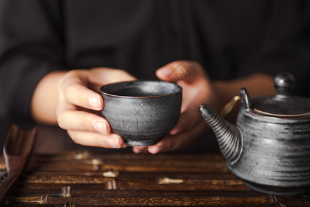 文化茶叶素材手端茶杯 茶文化背景