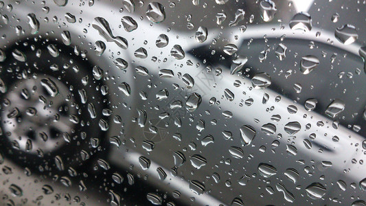 汽车雨刮雨天外的汽车背景
