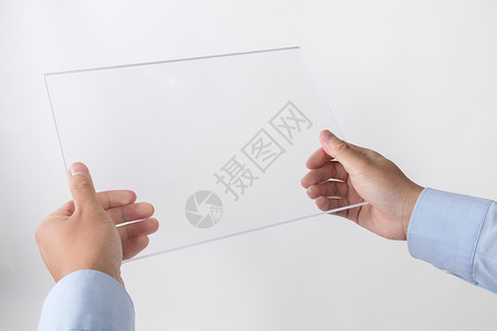 白色透明素材商务人士拿透明平板电脑背景