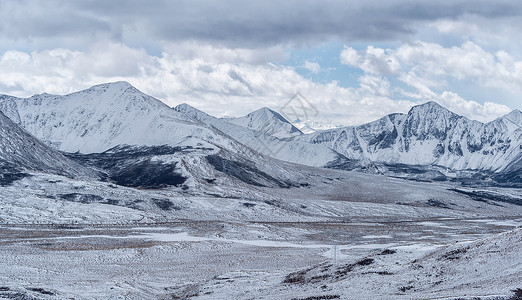 冷站西藏雪山远景背景
