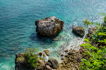 巴厘岛婚纱海中礁石背景