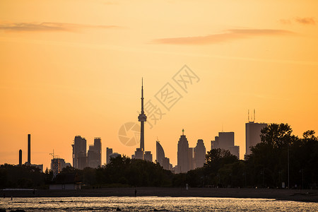 加拿大CN塔夕阳下的电视塔背景