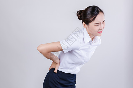 青年女性腰疼商务女士痛苦难受情绪表现背景