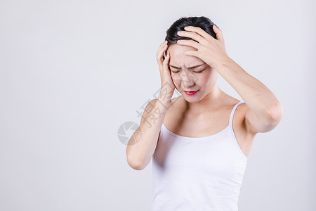 居家女人表现头痛情绪高清图片