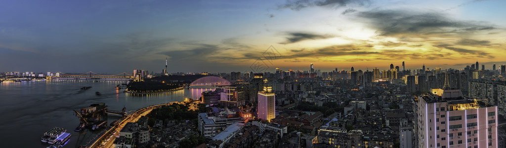 长江经济发展武汉长江大桥城市夜景全景背景