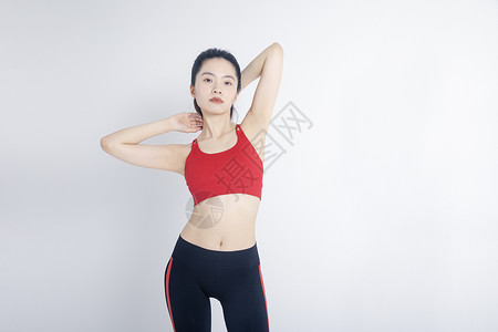 拉伸运动的健身女性背景图片