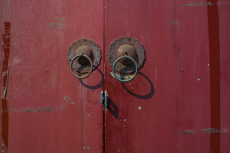 大门拉手北京胡同的老门环背景