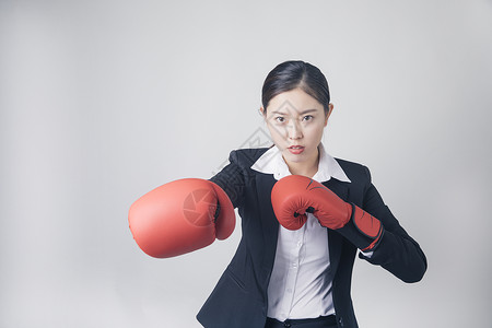 打拳击拳击手打拳击的职场女性背景