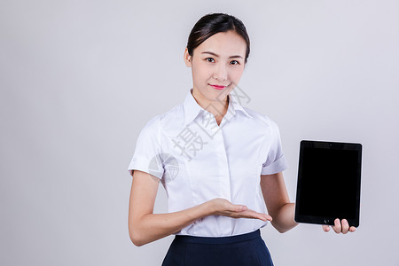 商务平板点击职业女性用平板电脑棚拍背景