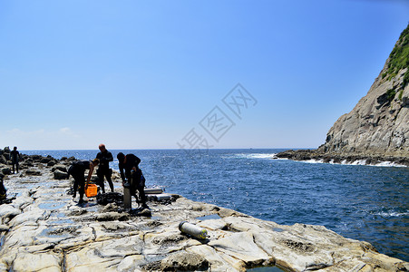 潜水准备韩国济州岛深海潜水前准备跳跃背景