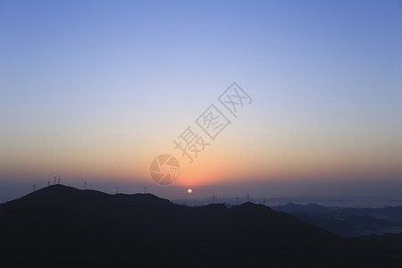 落日山顶背景图片