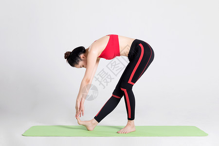 女性健身瑜伽动作棚拍背景图片