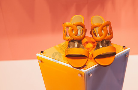橙色展示展台时尚的艳丽女鞋背景