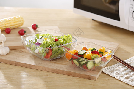 玻璃餐盘蔬菜水果色拉背景