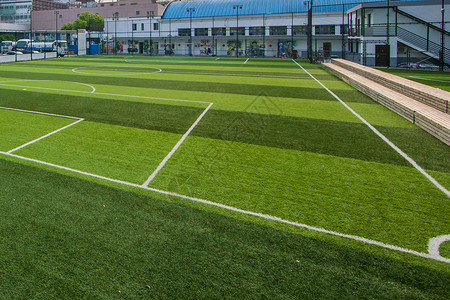 学校足球场绿色草地空中操场背景图片