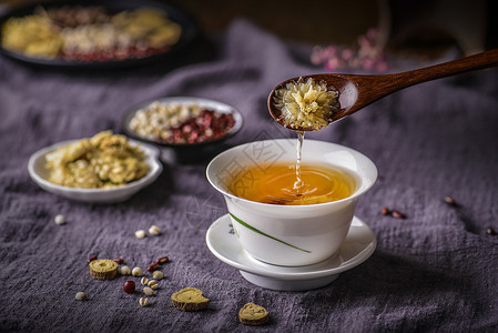 一碗茶浸泡的菊花茶背景