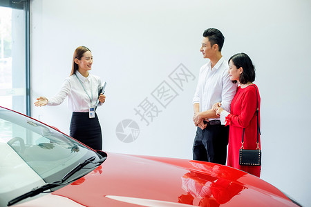 女性买车女性销售向客户介绍汽车背景