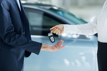 汽车销售交付钥匙背景图片